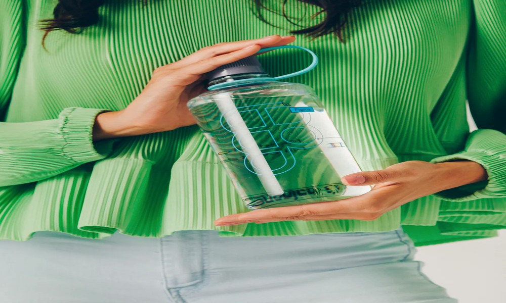 How do push-button lids affect drinking convenience?